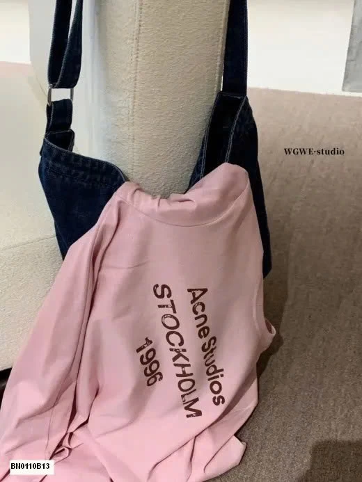 ÁO THUN CHỮ DÁNG RỘNG WGWE