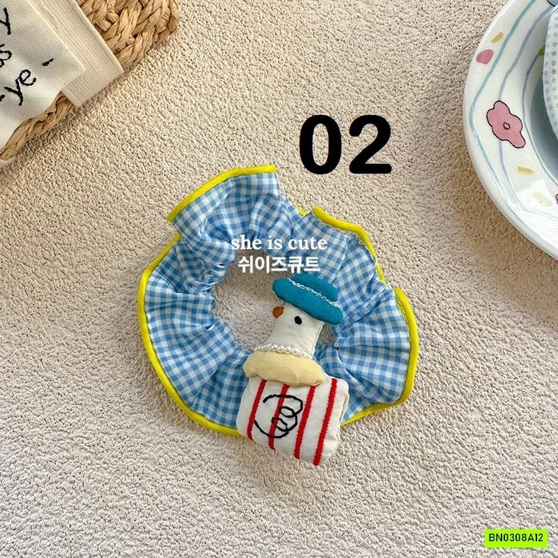 DÂY BUỘC TÓC CARO GẮN BÚP BÊ