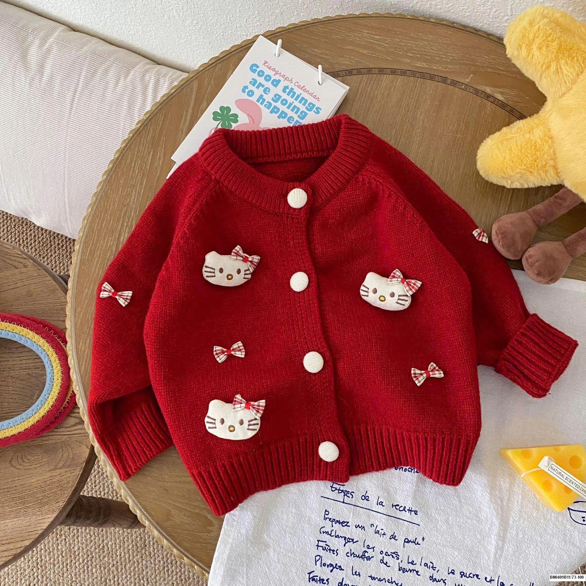 ÁO KHOÁC LEN KITY SZ NHÍ