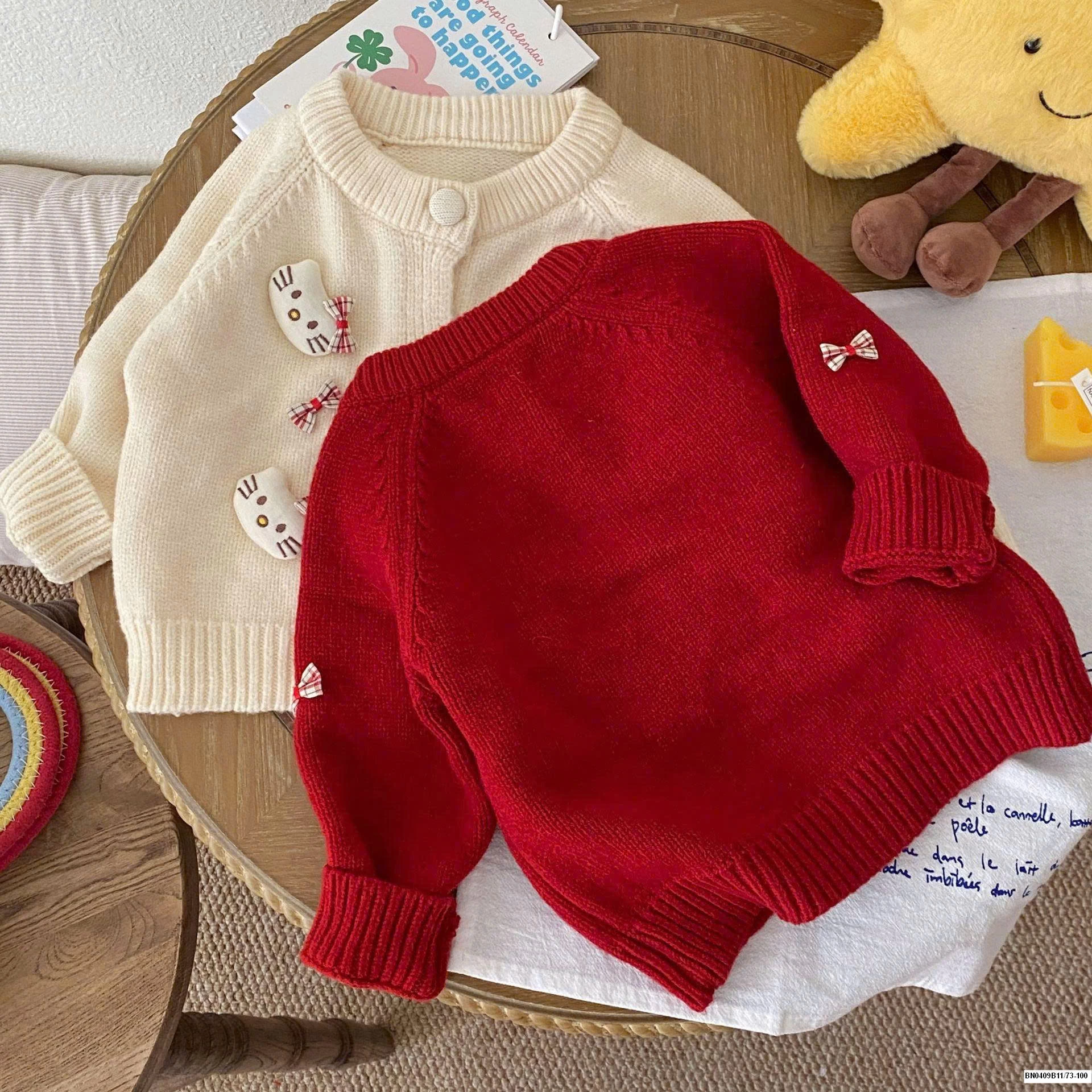 ÁO KHOÁC LEN KITY SZ NHÍ