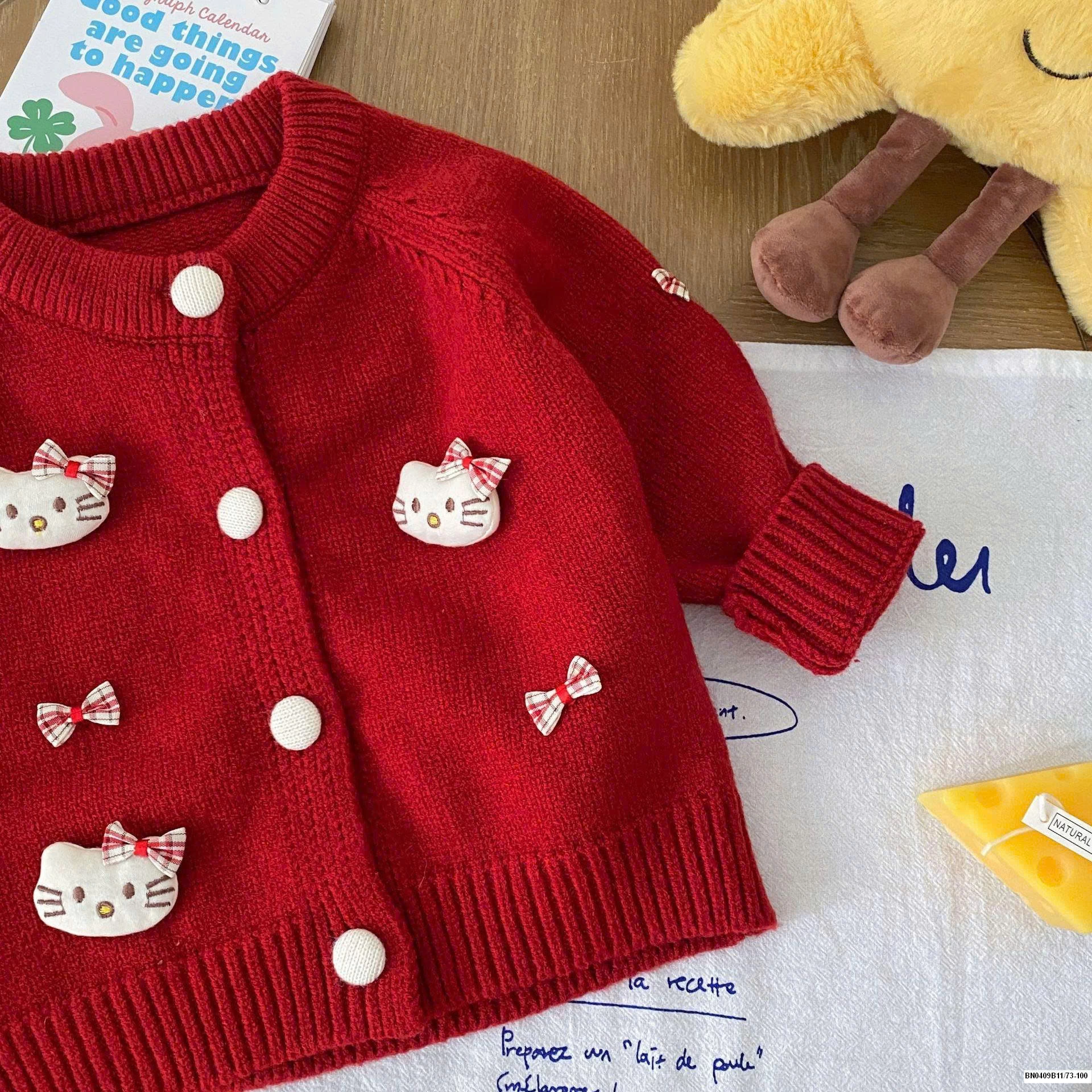 ÁO KHOÁC LEN KITY SZ NHÍ