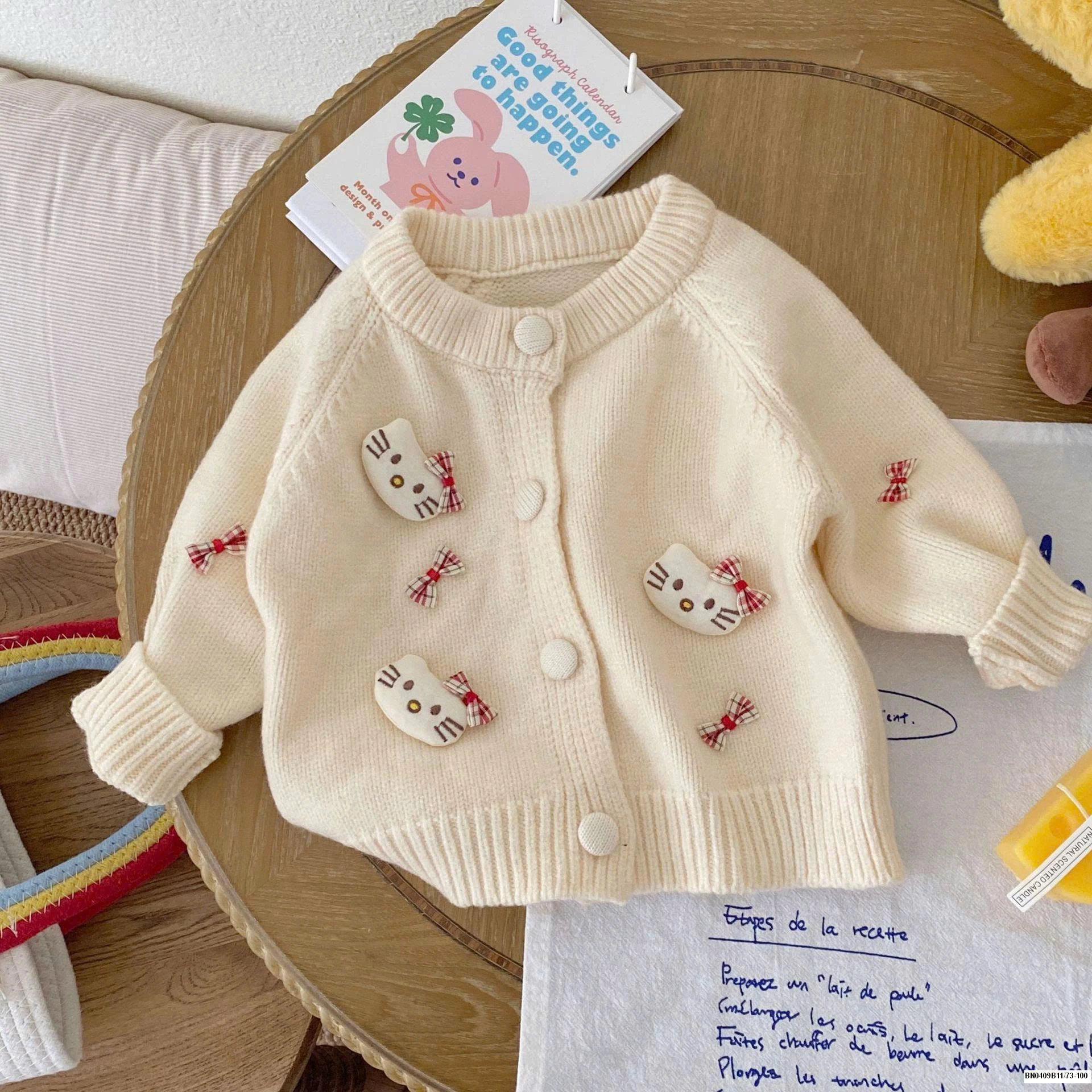 ÁO KHOÁC LEN KITY SZ NHÍ